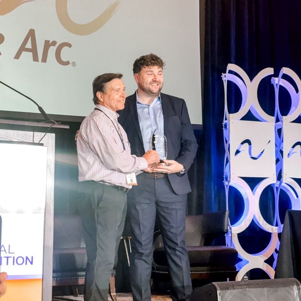 A Council member recognized for outstanding service at a statewide conference