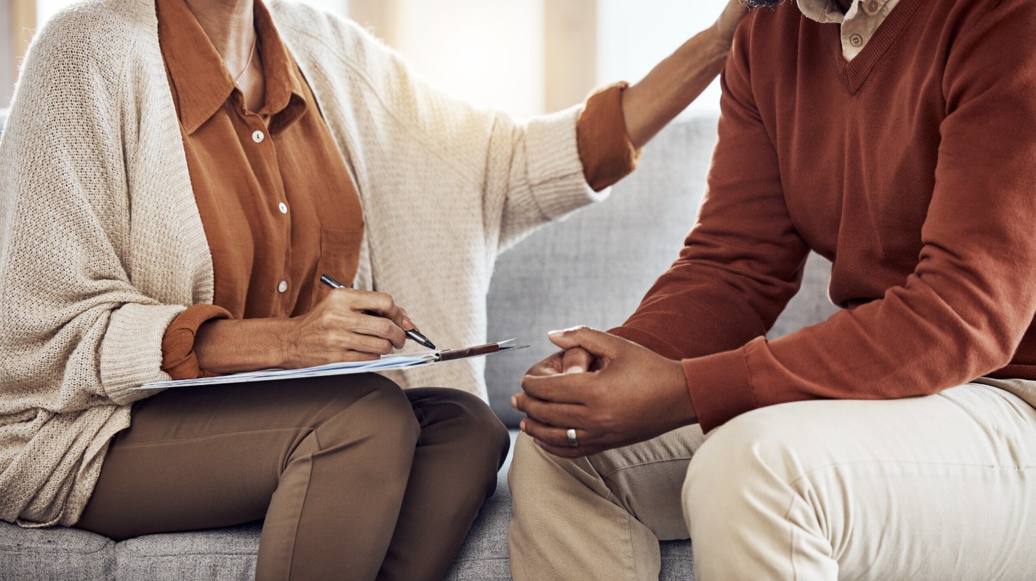 Family reviewing paperwork together at home