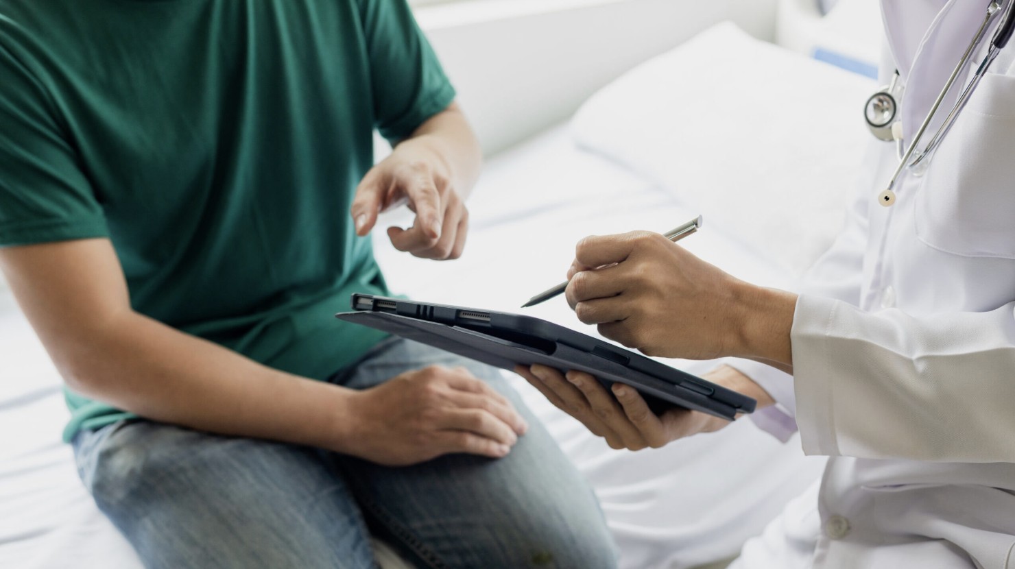 Healthcare provider reviewing a care plan with a patient